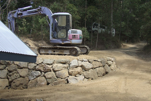 We built this Queensland bush rock Boulder Wall and many others on this property in South East Queensland