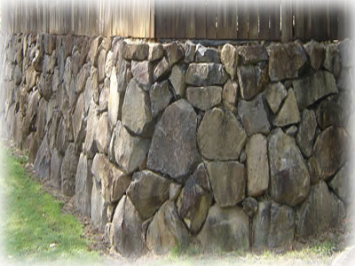 Split Basalt Boulders for retaining wall construction in Brisbane