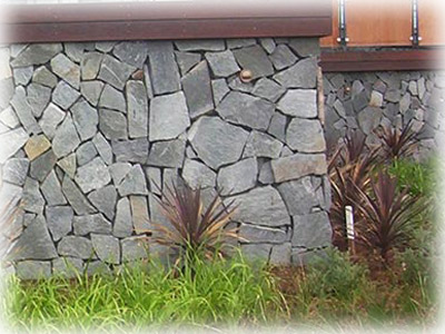 Split Porphyry Boulders for retaining wall construction in Brisbane
